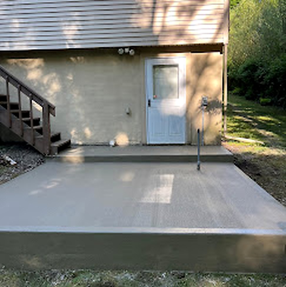 Larger concrete patio and back entry installation in NJ